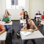 Female High School Teacher Taking Class